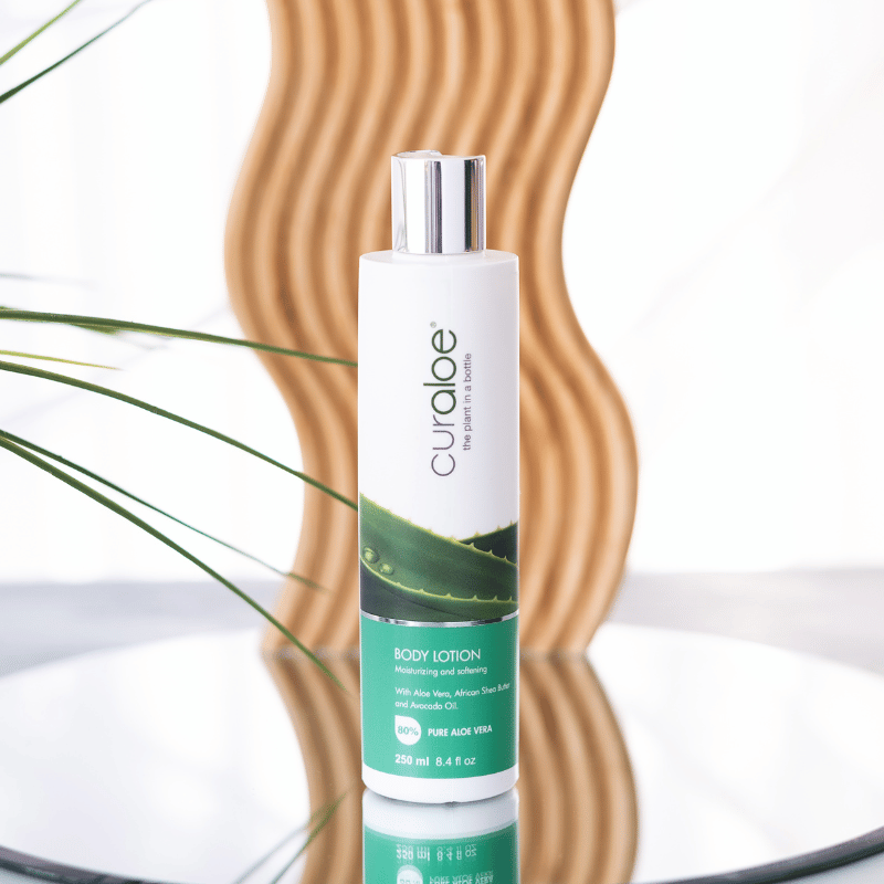 Moisturizing body lotion by Curaloe, ideal for protecting skin against environmental pollutants