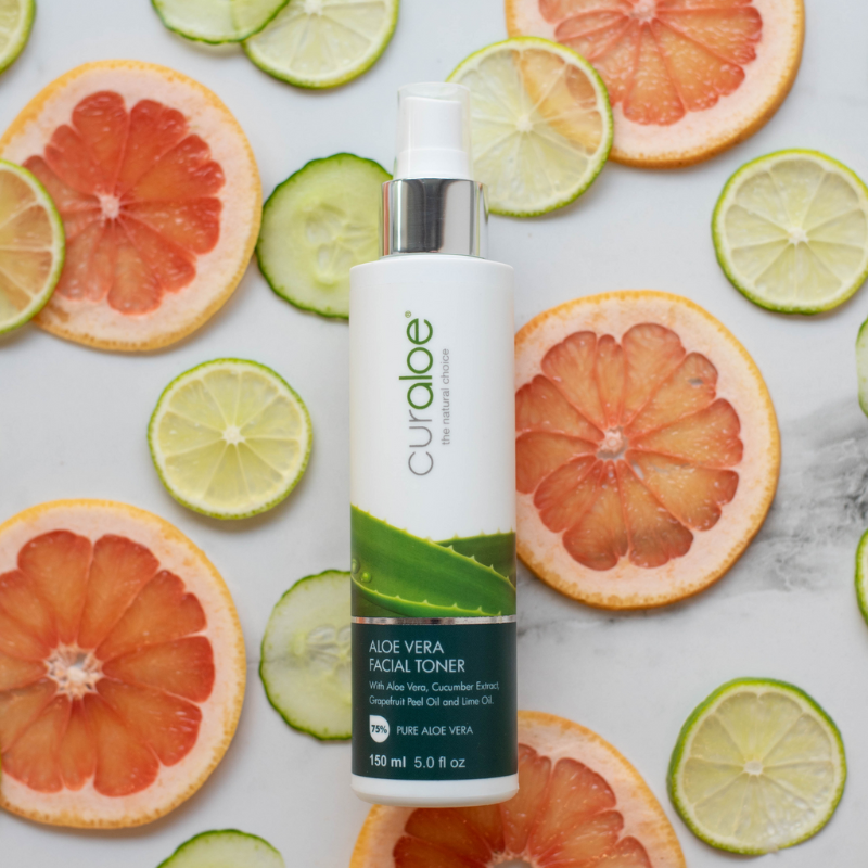 Refreshing facial toner by Curaloe with lime and grapefruit oils, targeting dark spots and controlling oiliness
